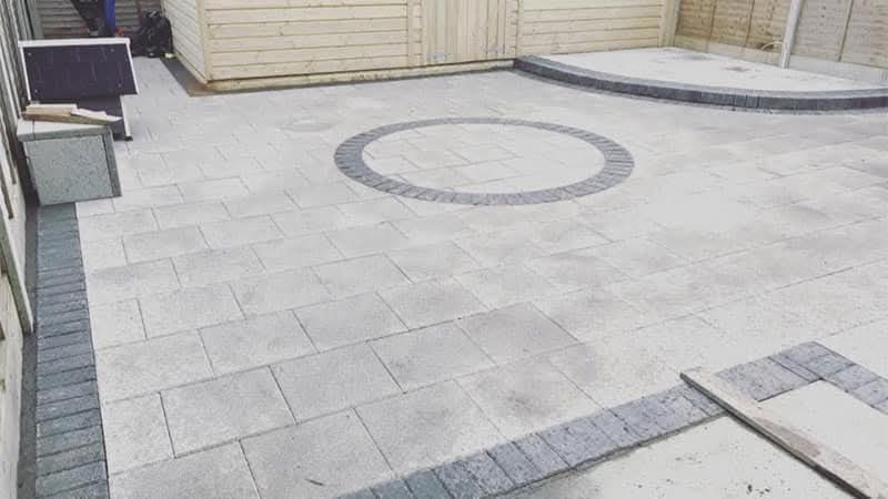 Patio paving with decorative circular feature, Swords